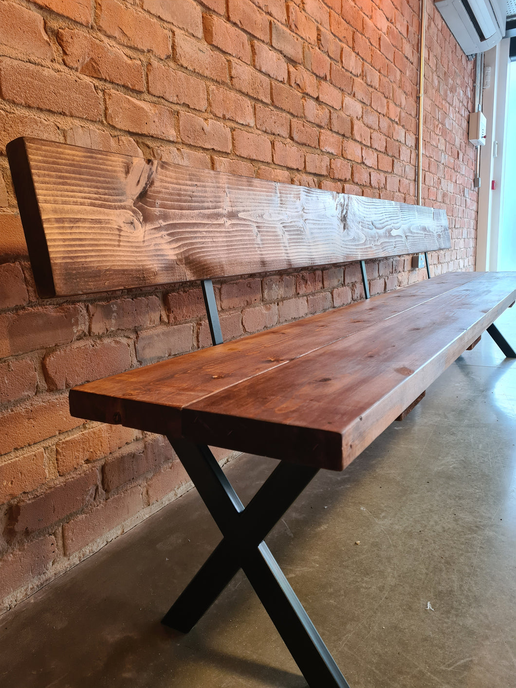 RUSTIC BACKED BENCH WITH CROSS FRAME LEGS